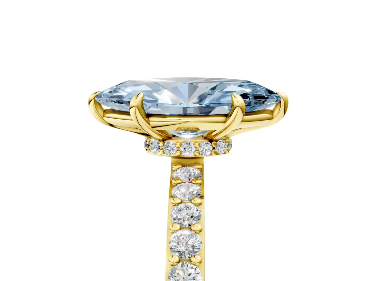 Fancy Blue Marquise Cut Diamond Solitaire Engagement Ring with Pavé Band and Four-Prong Setting Yellow gold