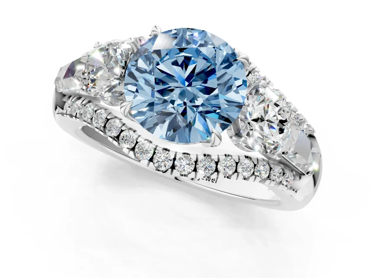 Fancy Blue Three-Stone Round Cut Diamond Engagement Ring with Pave Band and Prong Setting Platinum