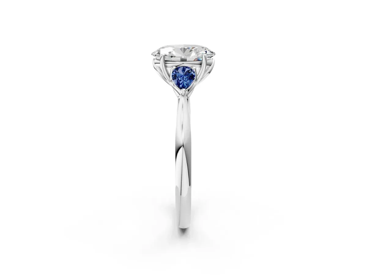 Oval Cut Diamond Three-Stone Ring with Pear Blue Sapphire Side Stones and Prong Setting Silver