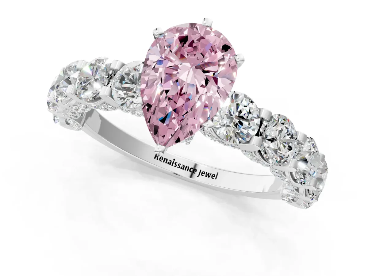 Fancy Pink Pear Cut Diamond Side Stone Engagement Ring with Four-Prong Setting Platinum