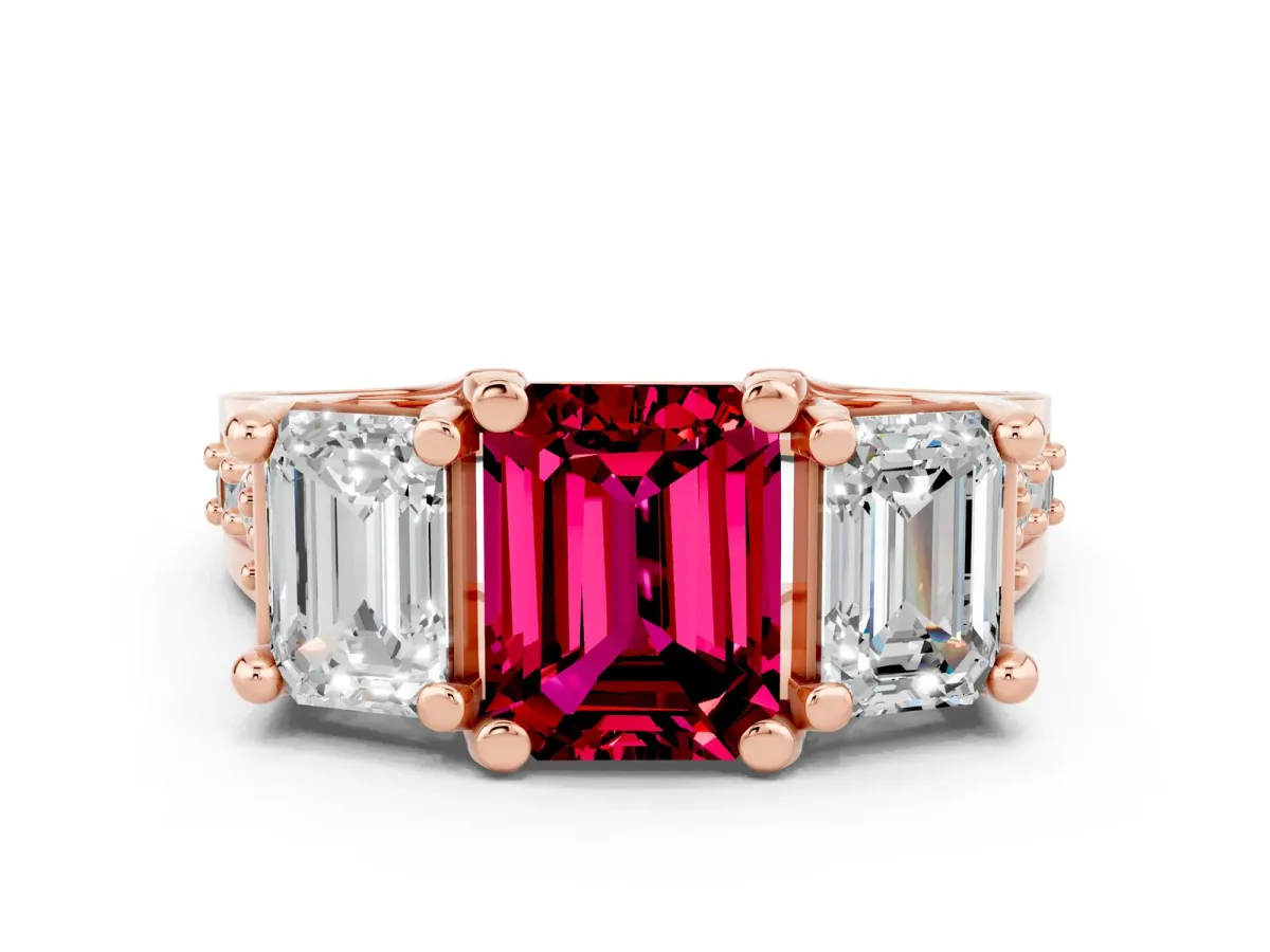 Emerald Cut Garnet Three-Stone Ring with Channel Set Band and Four-Prong Setting Rose gold
