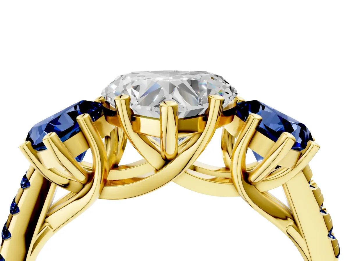 Three-Stone Heart Cut Diamond Ring with Round Blue Sapphire Pavé Band and Prong Setting Yellow gold