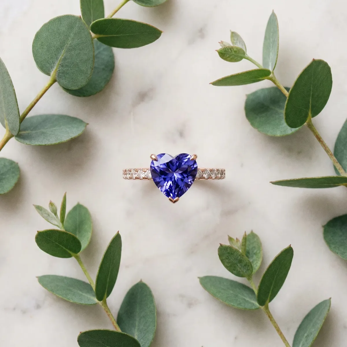 Heart Cut Tanzanite Solitaire Ring with Round Pavé Band and Four-Prong Setting Rose gold