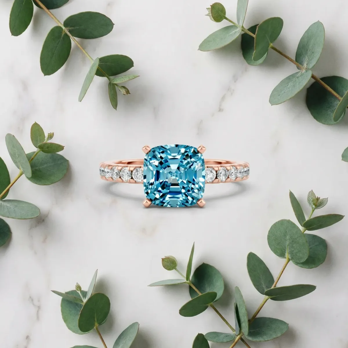 Cushion Cut Blue Topaz Solitaire Ring with Round Pavé Band and Four-Prong Setting Rose gold