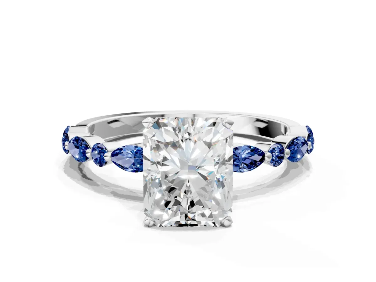 Radiant Cut Diamond Ring with Marquise and Round Blue Sapphire Side Stones and Four-Prong Setting Platinum