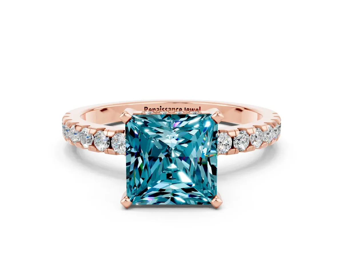 Princess Cut Blue Topaz Solitaire Ring with Round Pavé Band and Four-Prong Setting Rose gold