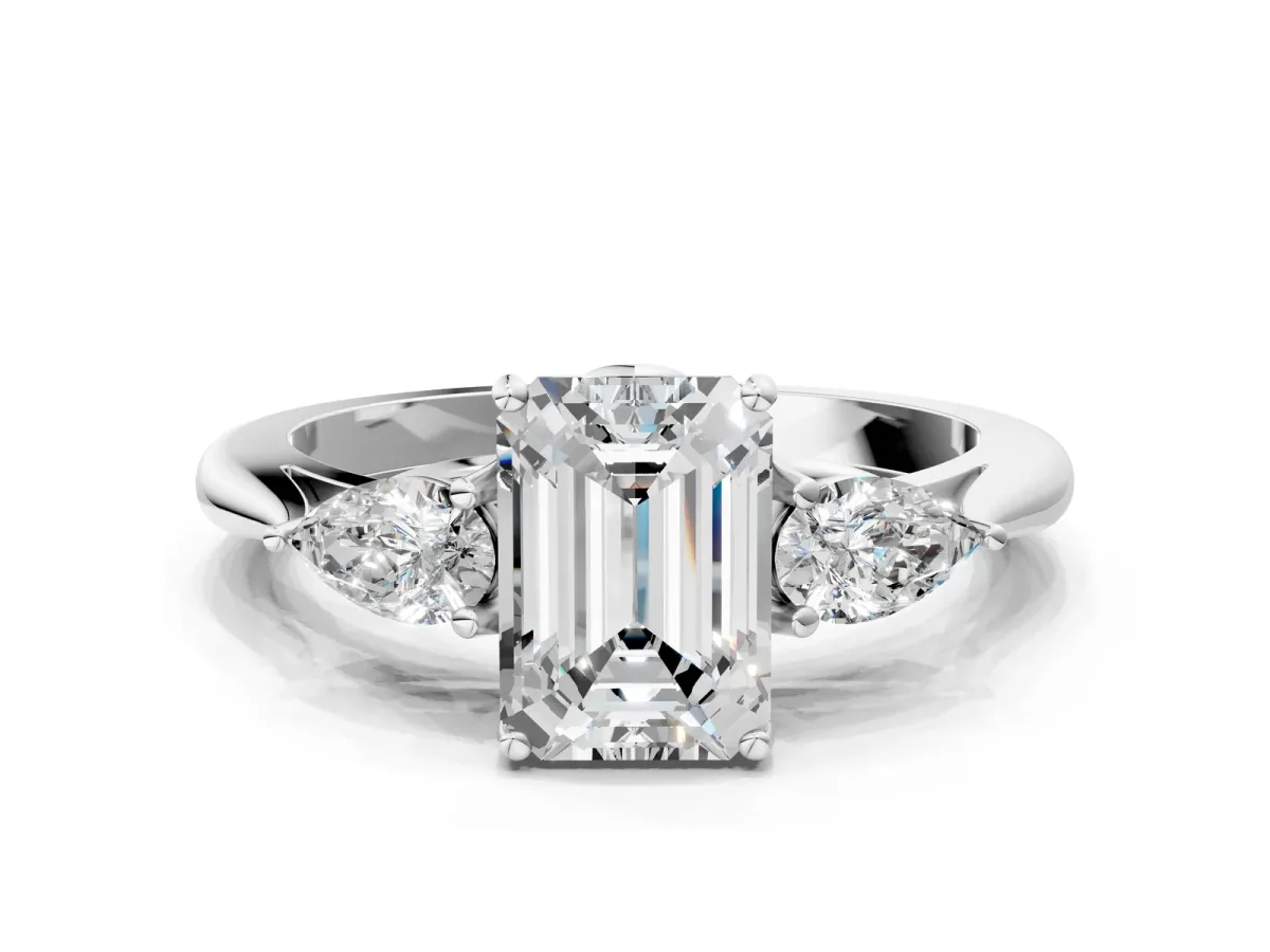 Three-Stone Emerald Cut Diamond Ring with Pear Side Stones in Four-Prong Setting White gold
