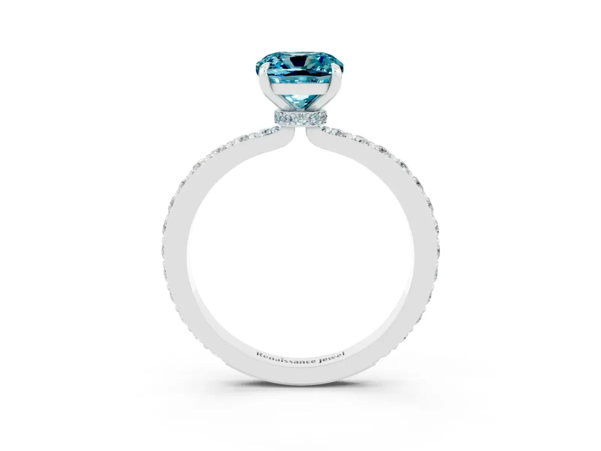 Cushion Cut Blue Topaz Solitaire Engagement Ring with Pavé Band and Four-Prong Setting White gold
