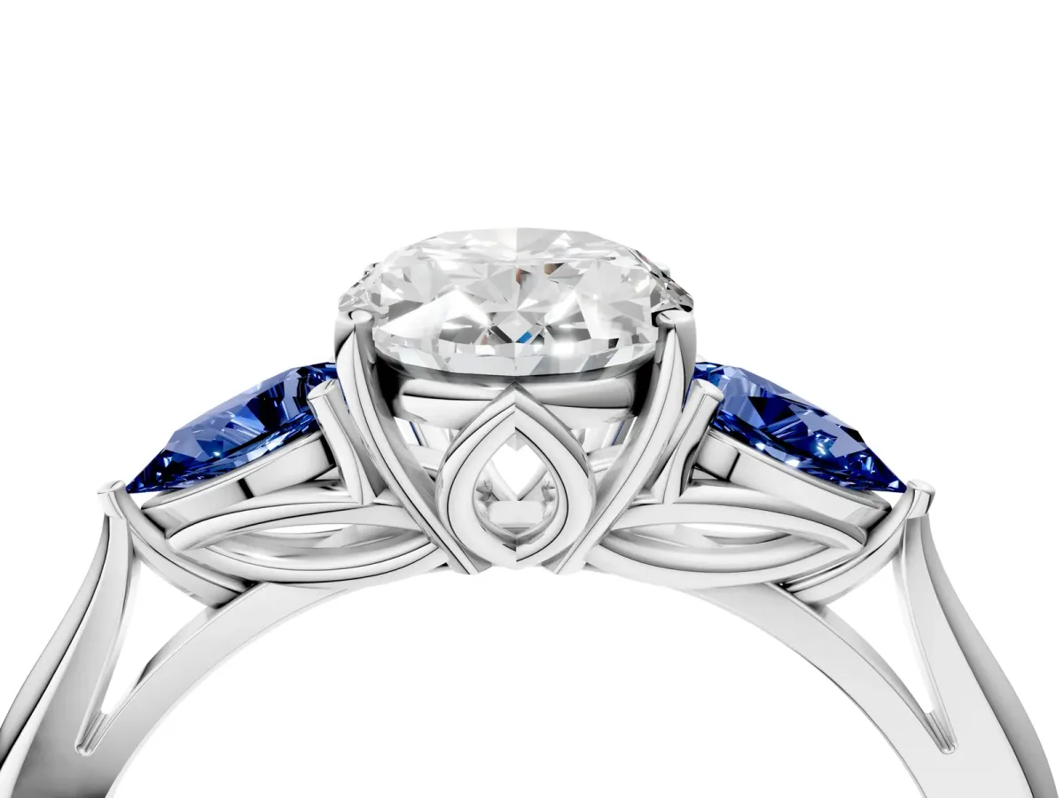 Oval Cut Diamond Three-Stone Ring with Pear Blue Sapphire Side Stones and Prong Setting Silver