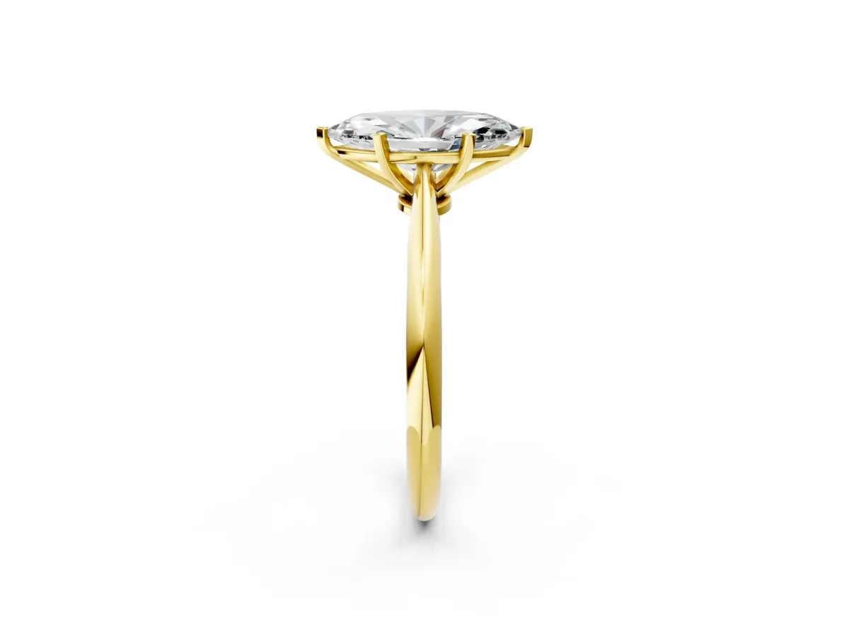 Marquise Cut Diamond Solitaire Engagement Ring with Classic Band and Four-Prong Setting Yellow gold