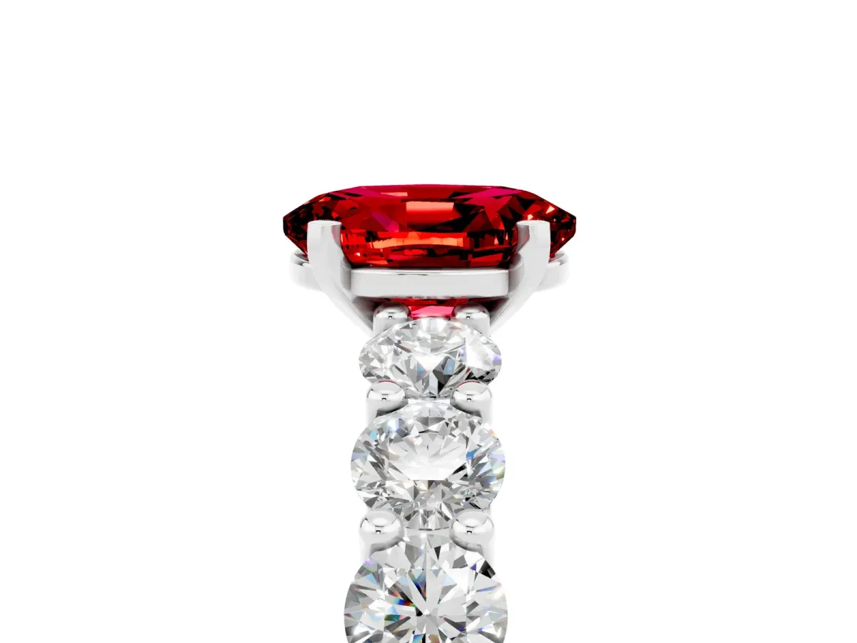 Oval Cut Ruby Prong Setting with Side Stones on a Pave Band Silver