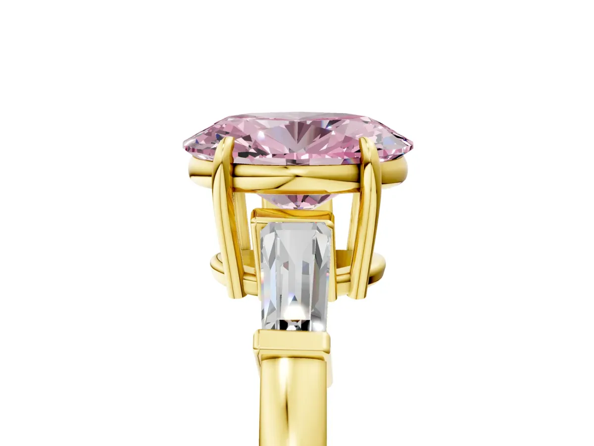 Fancy Pink Oval Cut Diamond Three-Stone Ring with Tapered Baguette Side Stones and Prong Setting Yellow gold