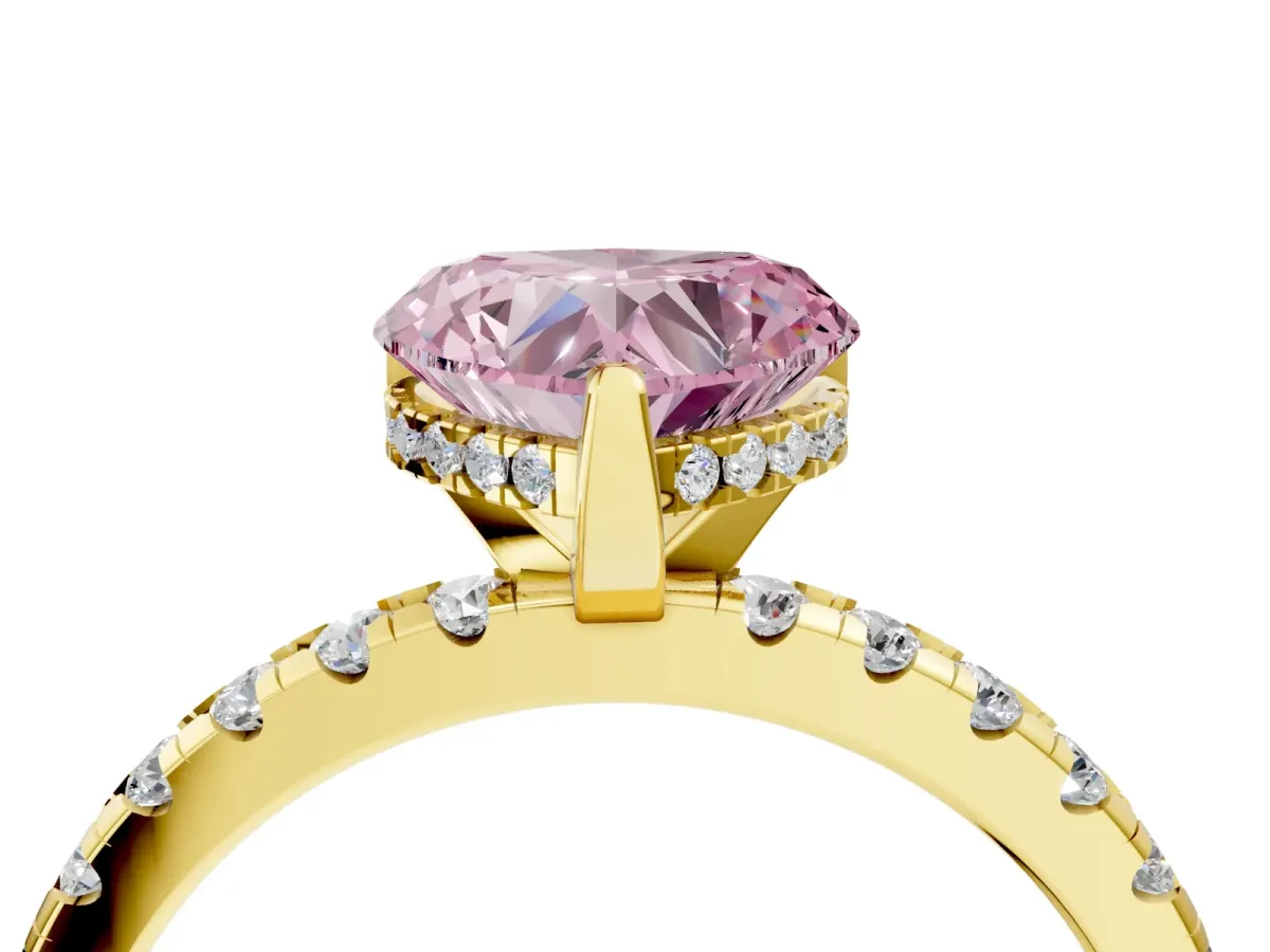 Fancy Pink Heart Cut Diamond Solitaire Ring with Round Pavé Band and Four-Prong Setting Yellow gold