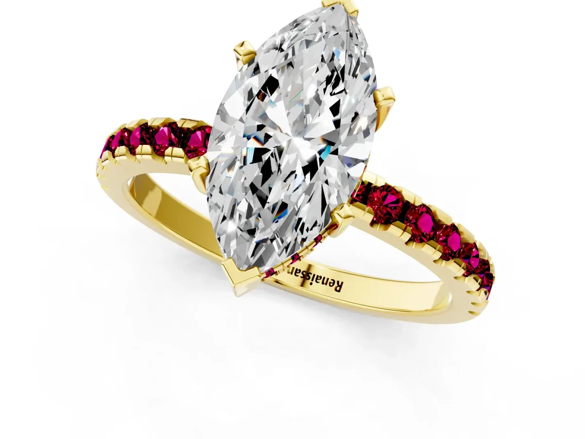 Marquise Cut Diamond Solitaire Ring with Round Garnet Pavé Band and Four-Prong Setting Yellow gold