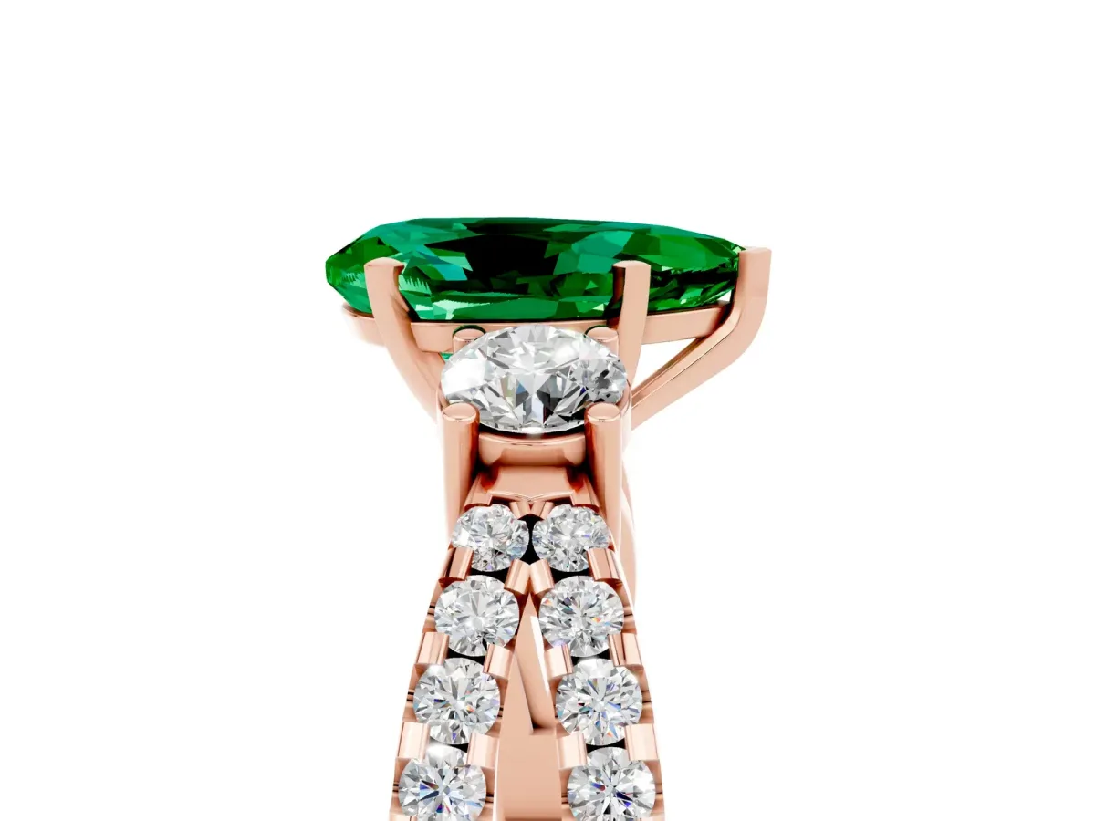 Pear Cut Emerald Three-Stone Ring with Pavé Split Shank and Four-Prong Setting Rose gold