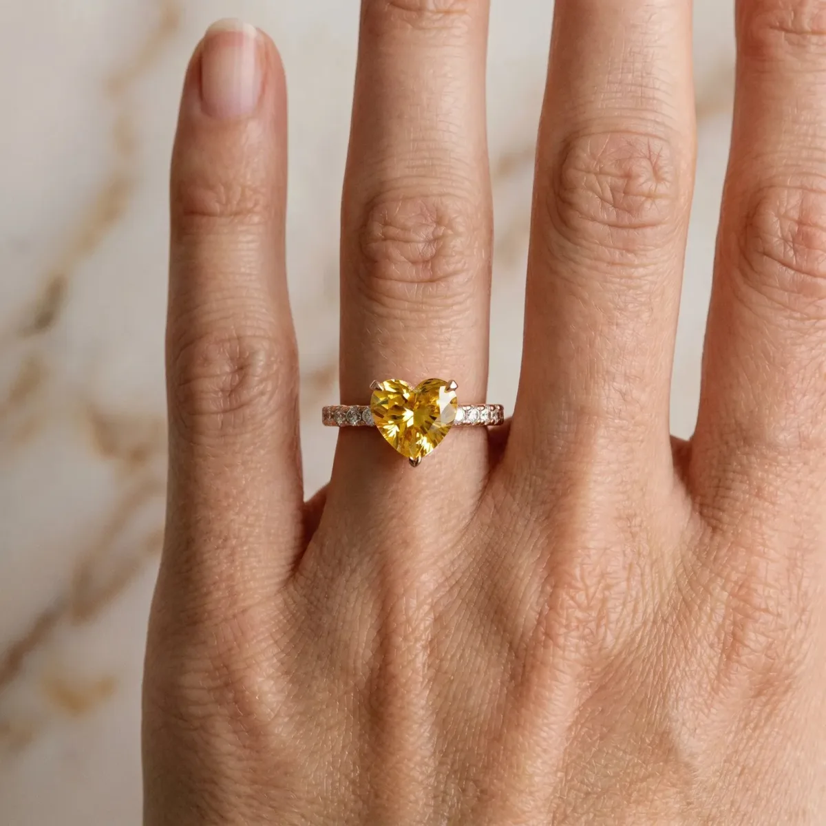 Heart Cut Yellow Sapphire Solitaire Ring with Round Pavé Band and Four-Prong Setting Rose gold