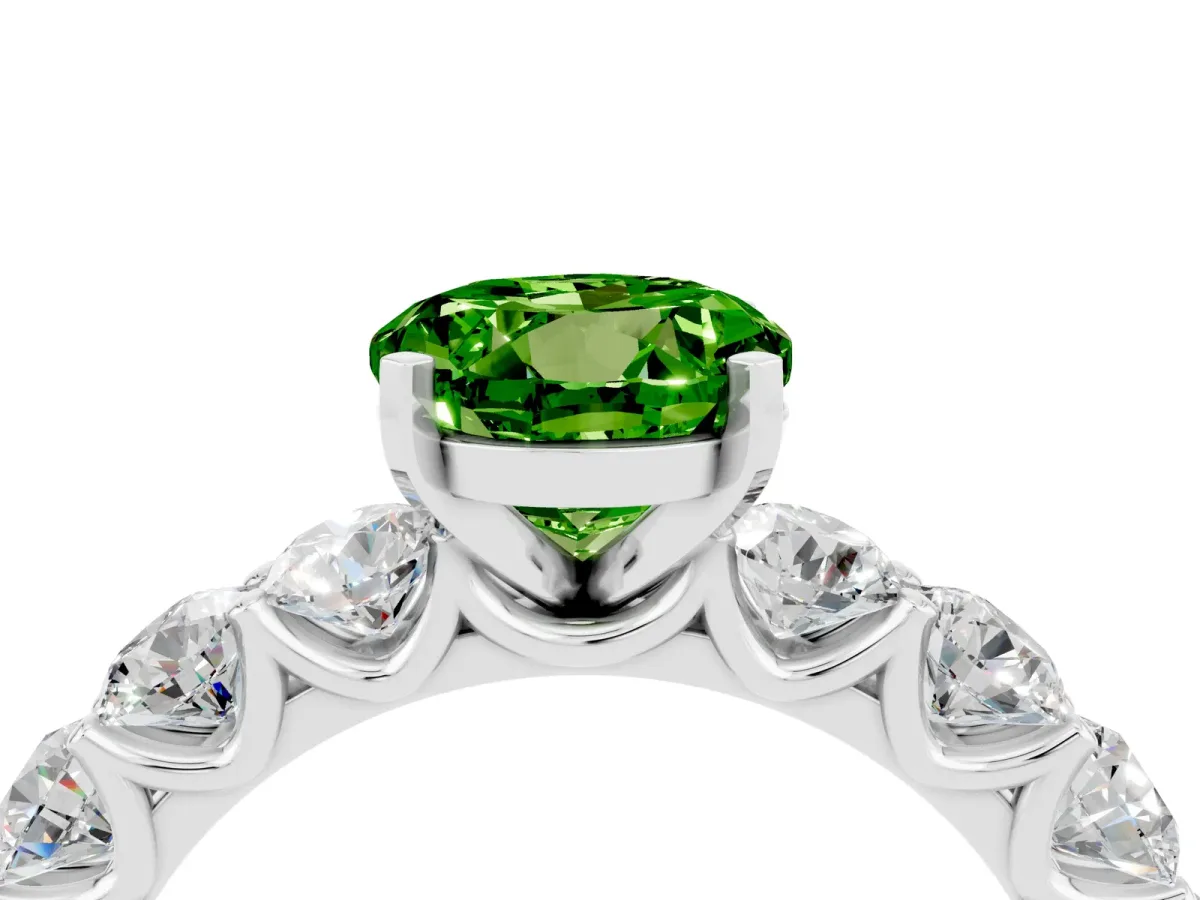 Round Cut Peridot Prong Setting with Side Stones on a Pave Band Platinum
