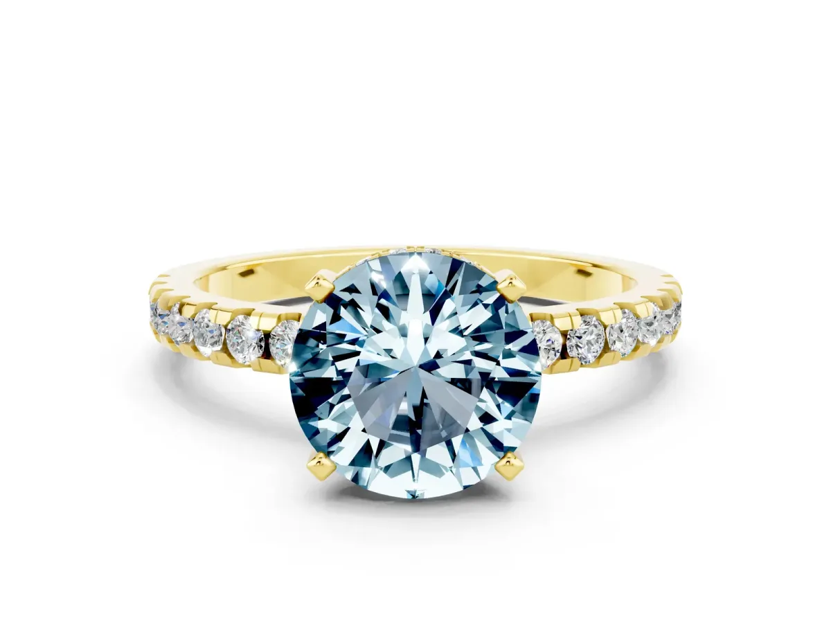 Round Cut Aquamarine Solitaire Ring with Round Pavé Band and Four-Prong Setting Yellow gold