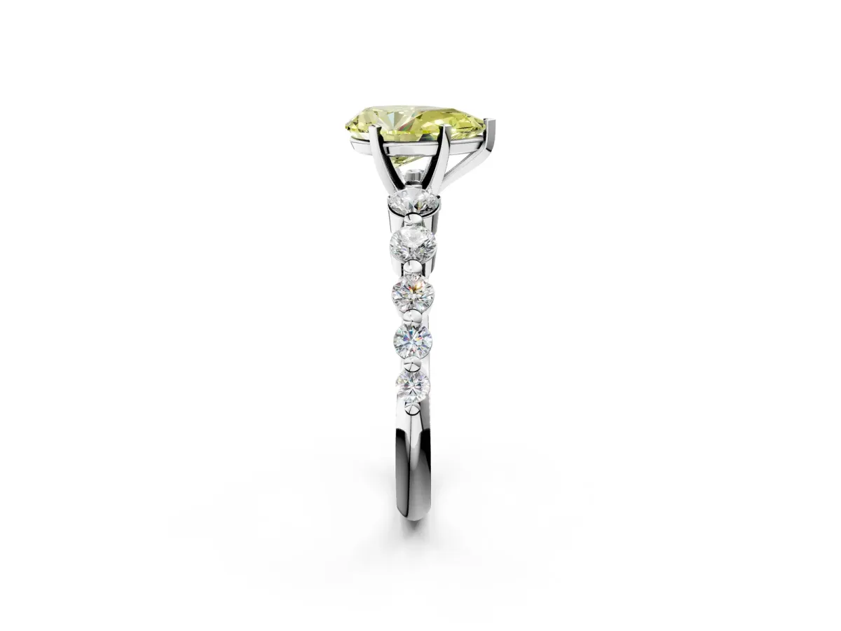 Fancy Yellow Pear Cut Solitaire Diamond Ring with Pave Band and Four-Prong Setting Platinum