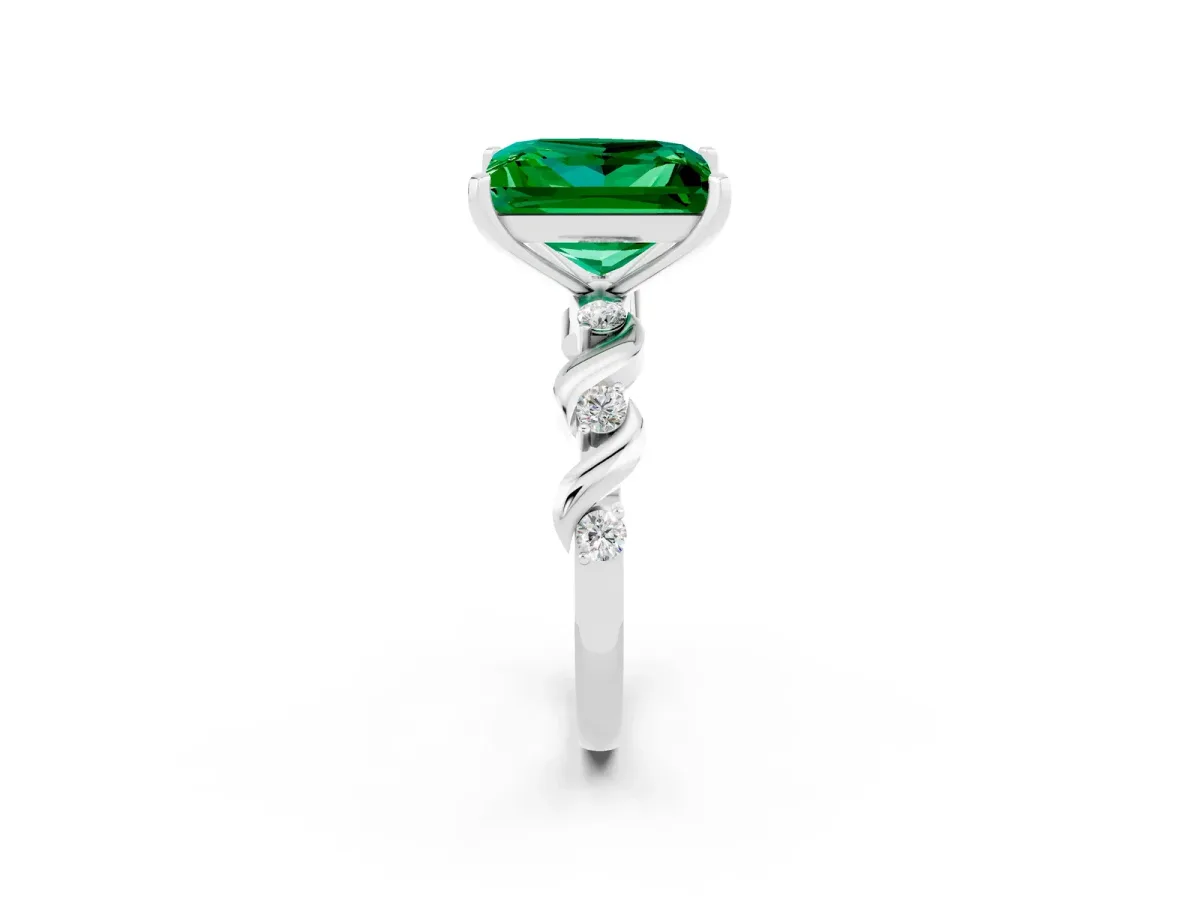 Princess Cut Emerald Solitaire Twisted Band with Round Accents and Prong Setting Silver