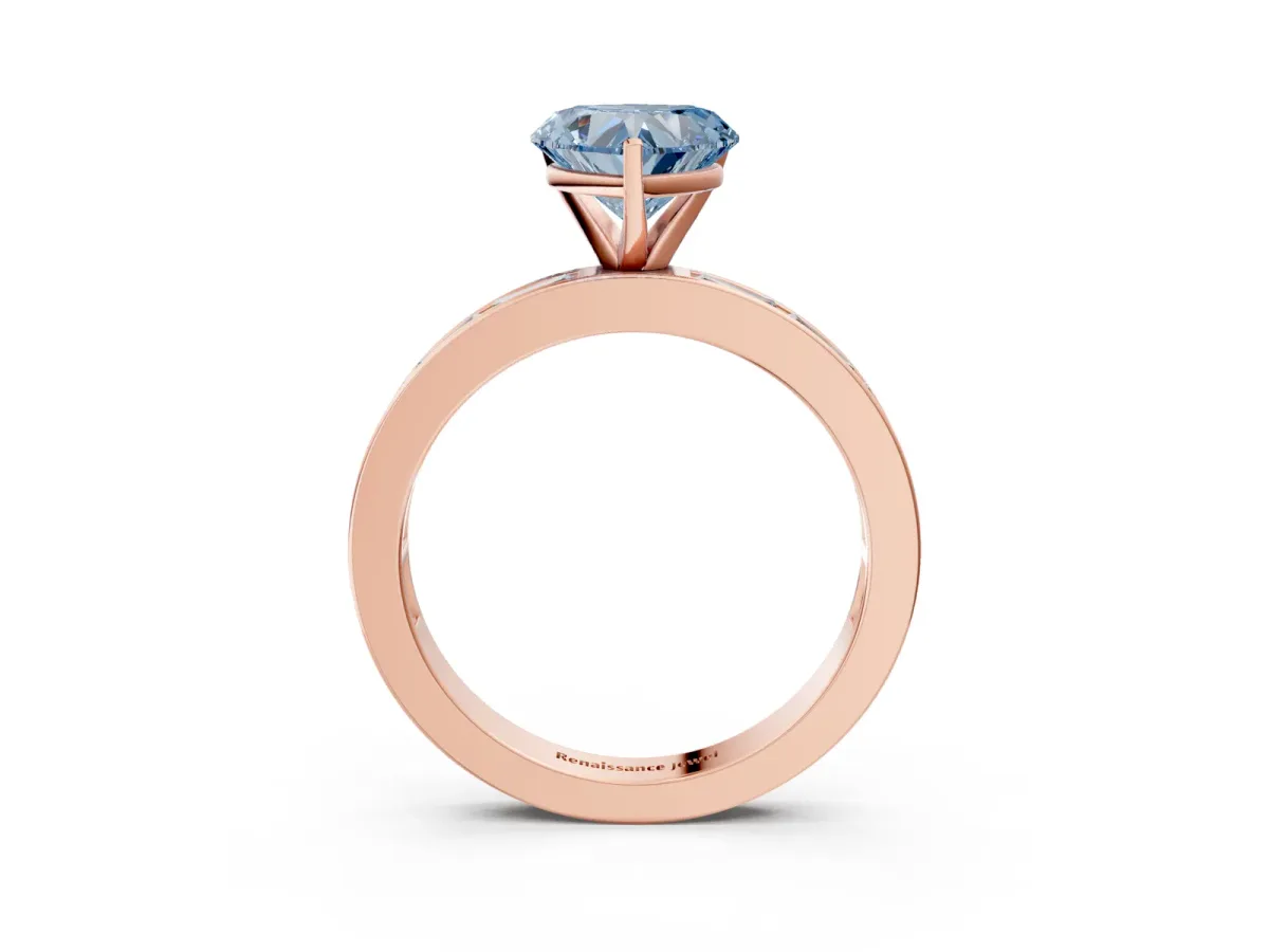 Fancy Blue Heart Cut Solitaire Diamond Ring with Channel-Set Baguette Band and Four-Prong Setting Rose gold