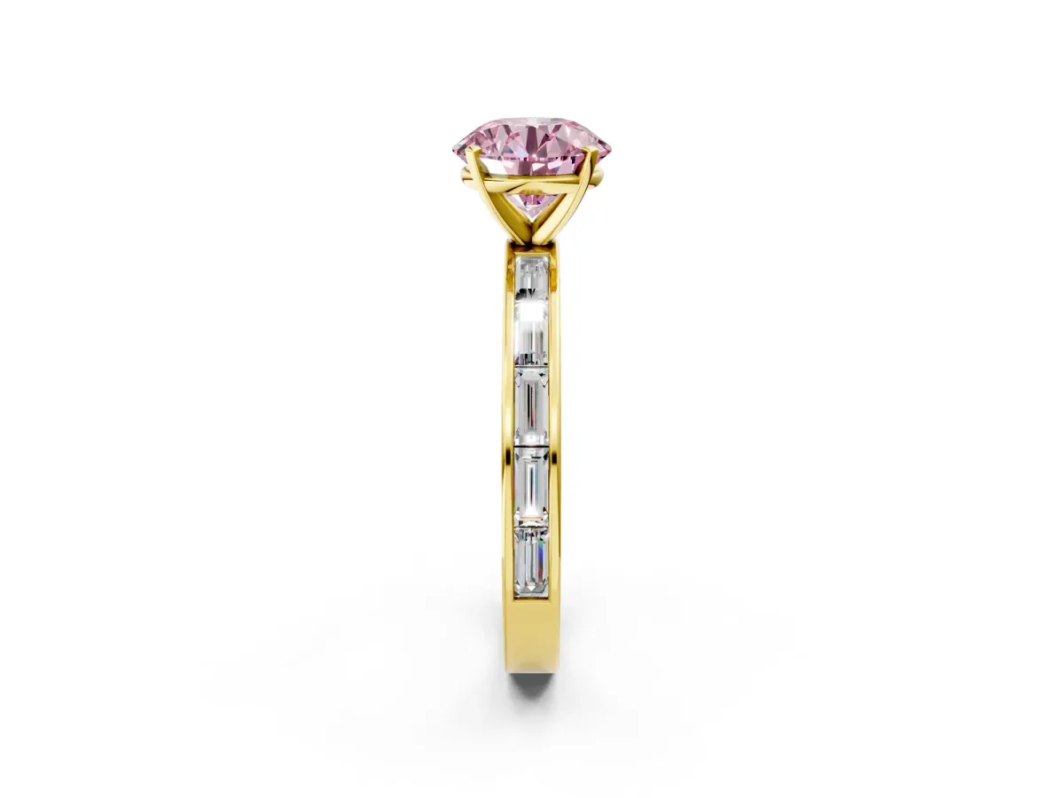 Fancy Pink Round Cut Solitaire Diamond Ring with Channel-Set Baguette Band and Four-Prong Setting Yellow gold