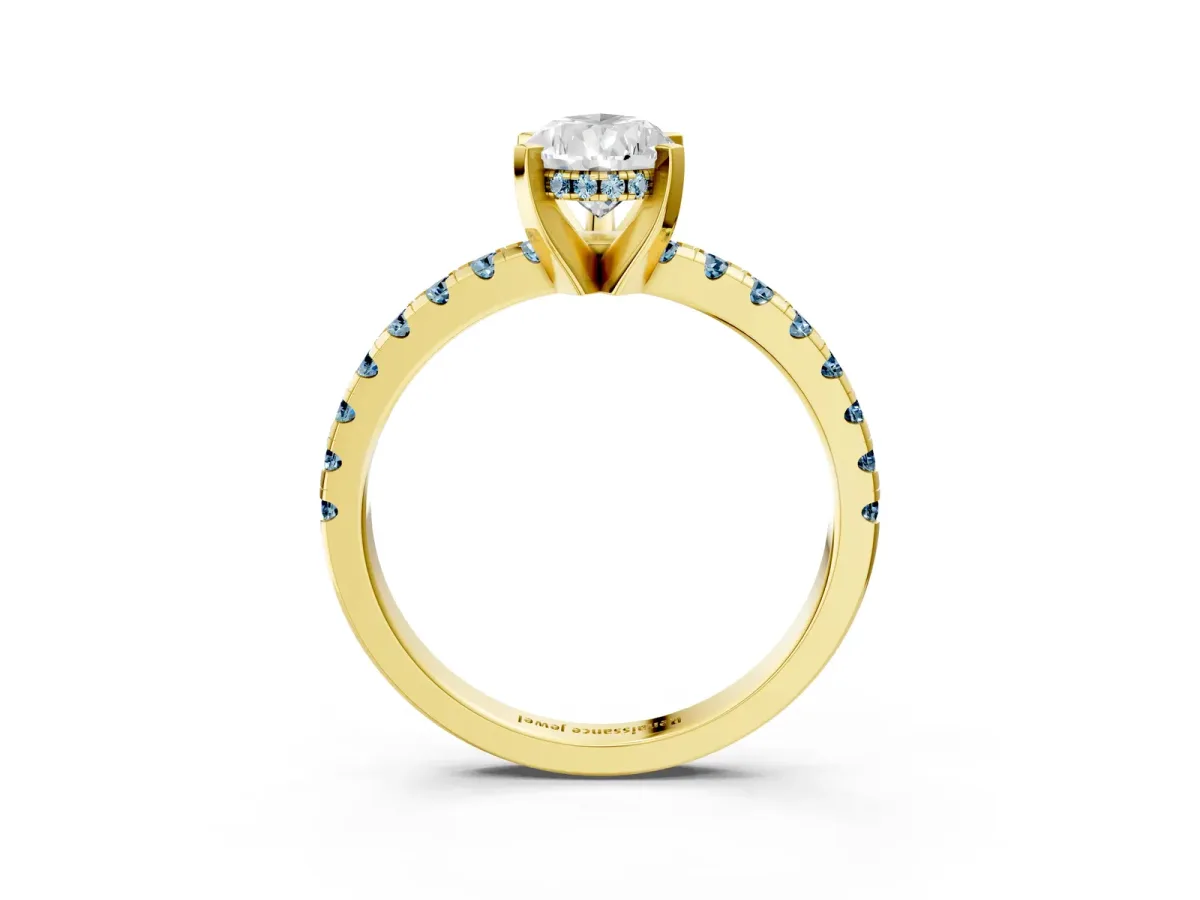 Pear Cut Diamond Solitaire Ring with Round Aquamarine Pavé Band and Four-Prong Setting Yellow gold