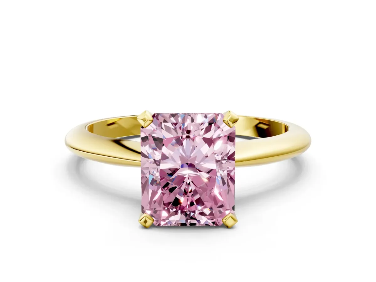 Fancy Pink Radiant Cut Diamond Solitaire Engagement Ring with Classic Band and Four-Prong Setting Yellow gold