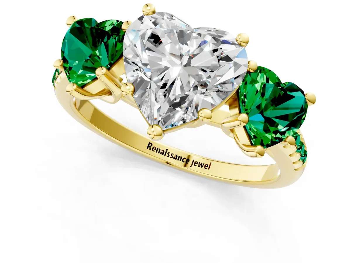 Three-Stone Heart Cut Diamond Ring with Round Emerald Pavé Band and Prong Setting Yellow gold