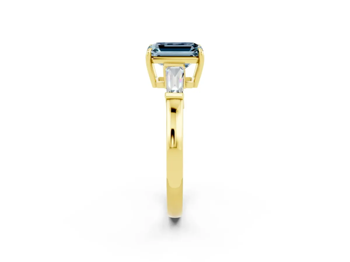 Emerald Cut Aquamarine Three-Stone Ring with Tapered Baguette Side Stones and Prong Setting Yellow gold