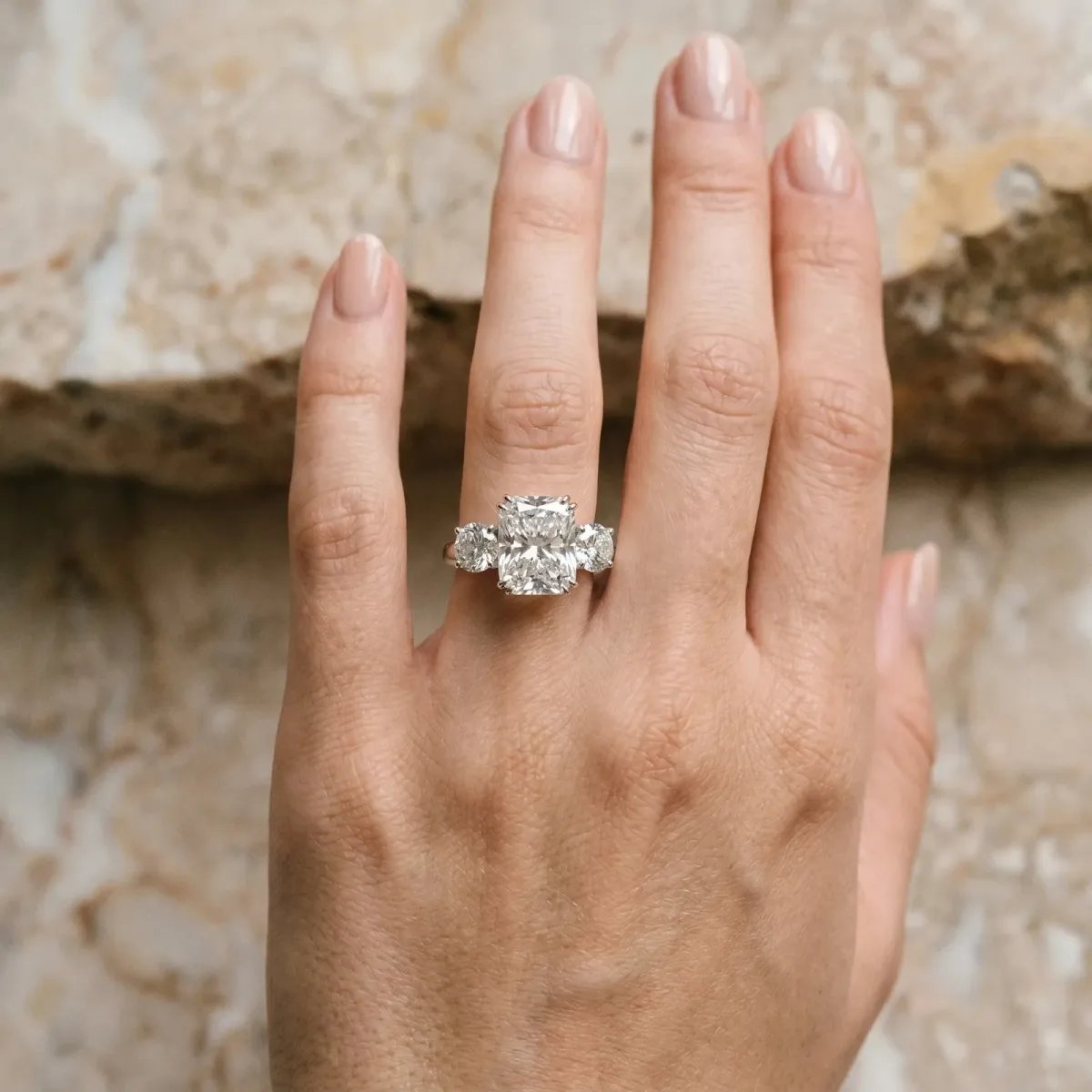 Three-Stone Radiant Cut Cut Diamond Engagement Ring with Prong Setting on a White Gold Band Silver