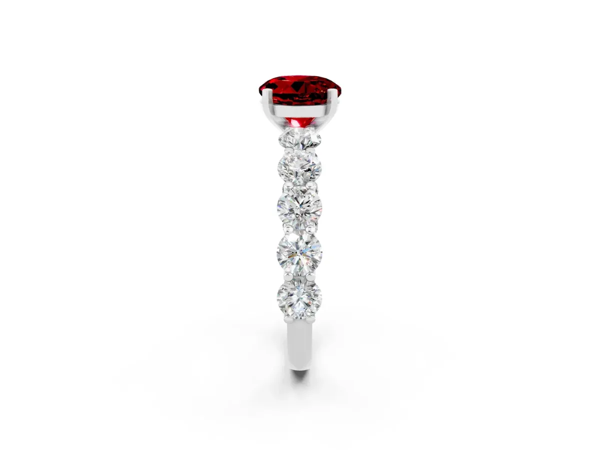 Round Cut Ruby Prong Setting with Side Stones on a Pave Band White gold