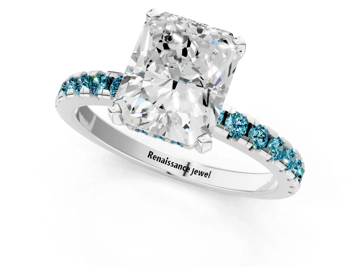 Radiant Cut Diamond Solitaire Ring with Round Blue Topaz Pavé Band and Four-Prong Setting White gold