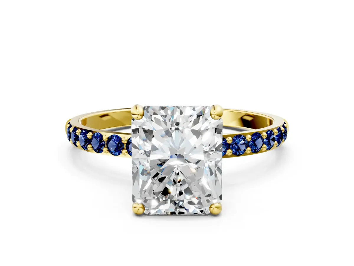 Radiant Cut Diamond Solitaire Ring with Round Blue Sapphire Pavé Band and Prong Setting Yellow gold