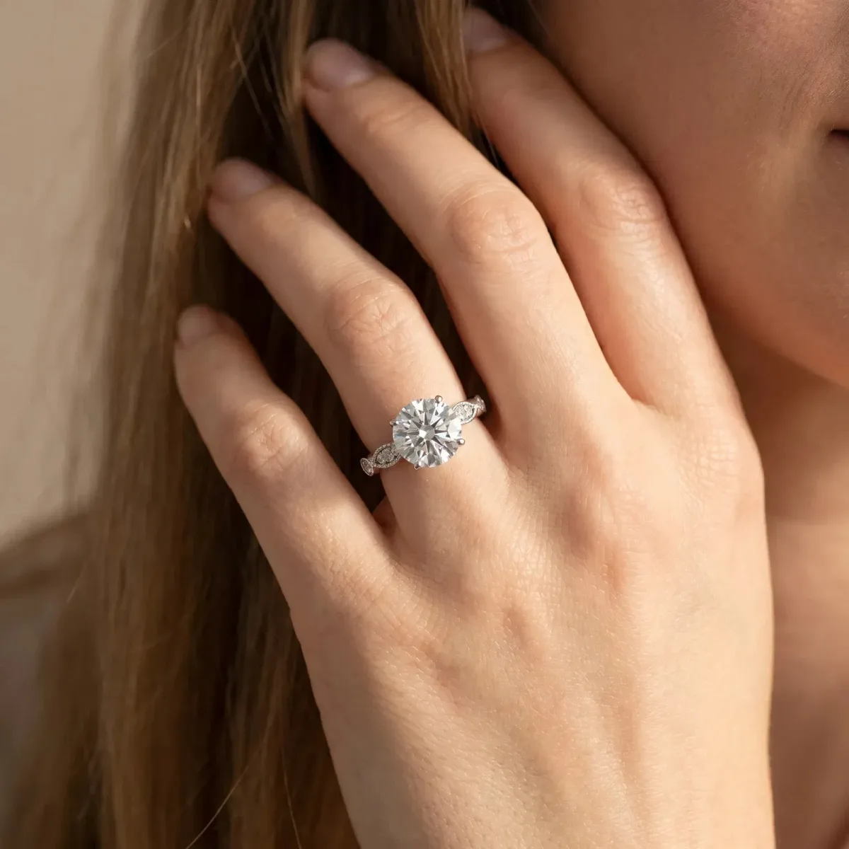 Round Cut Cut Diamond with Milgrain Marquise and Bezel Accents on a Solitaire Band with Prong Setting Silver