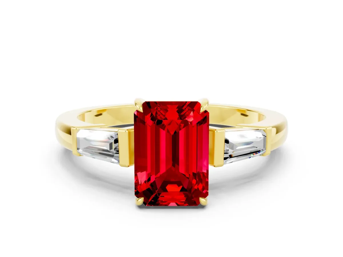 Emerald Cut Ruby Three-Stone Ring with Tapered Baguette Side Stones and Prong Setting Yellow gold