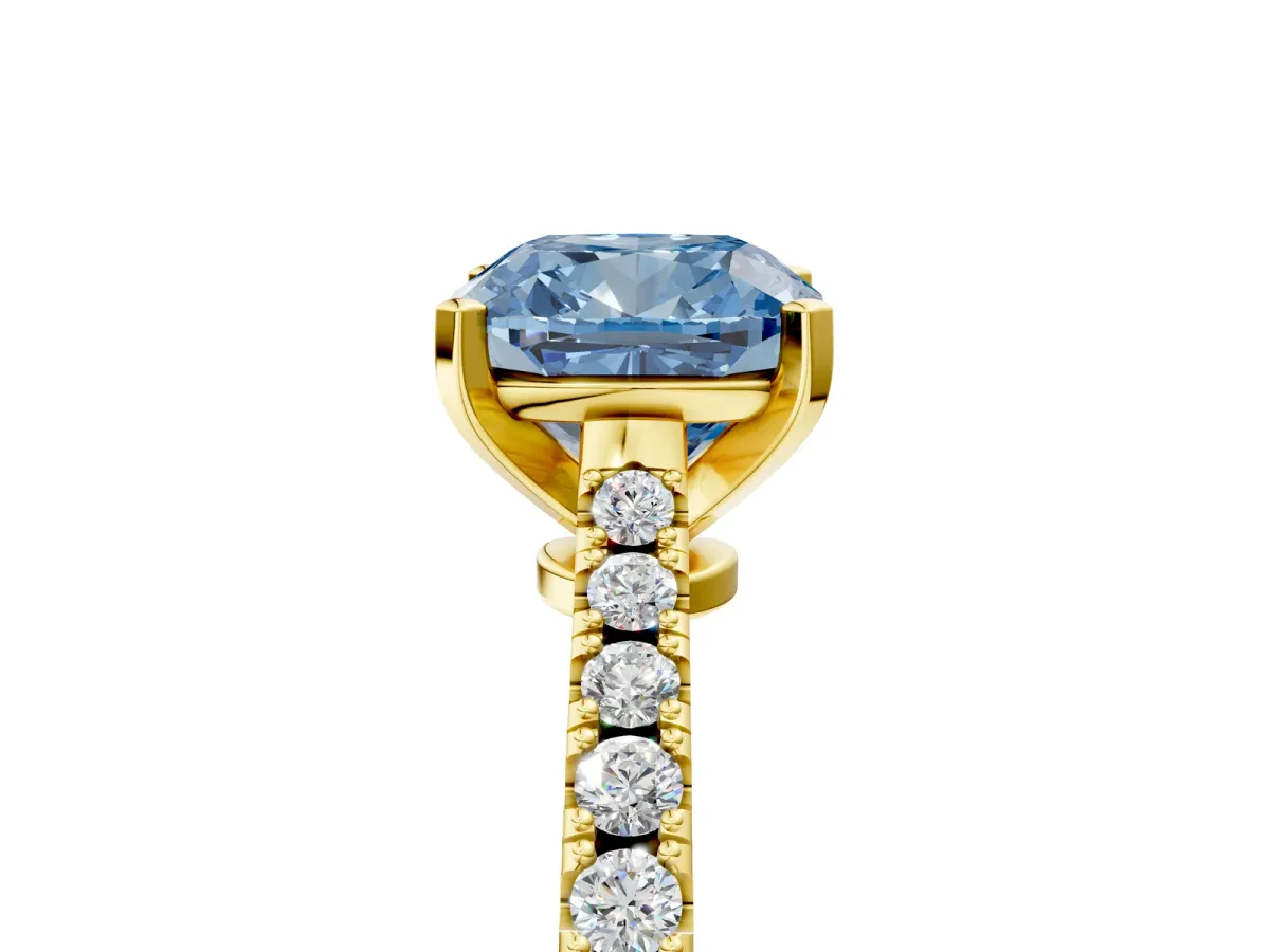 Fancy Blue Cushion Cut Cut Solitaire Diamond Engagement Ring with Pave Band and Four-Prong Setting Yellow gold