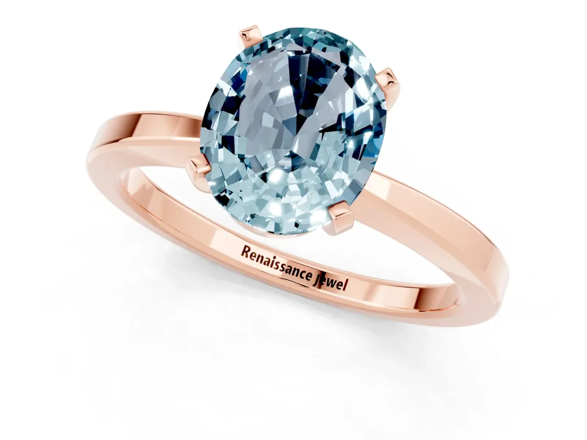 Oval Cut Aquamarine Solitaire Engagement Ring with Classic Band and Four-Prong Setting Rose gold