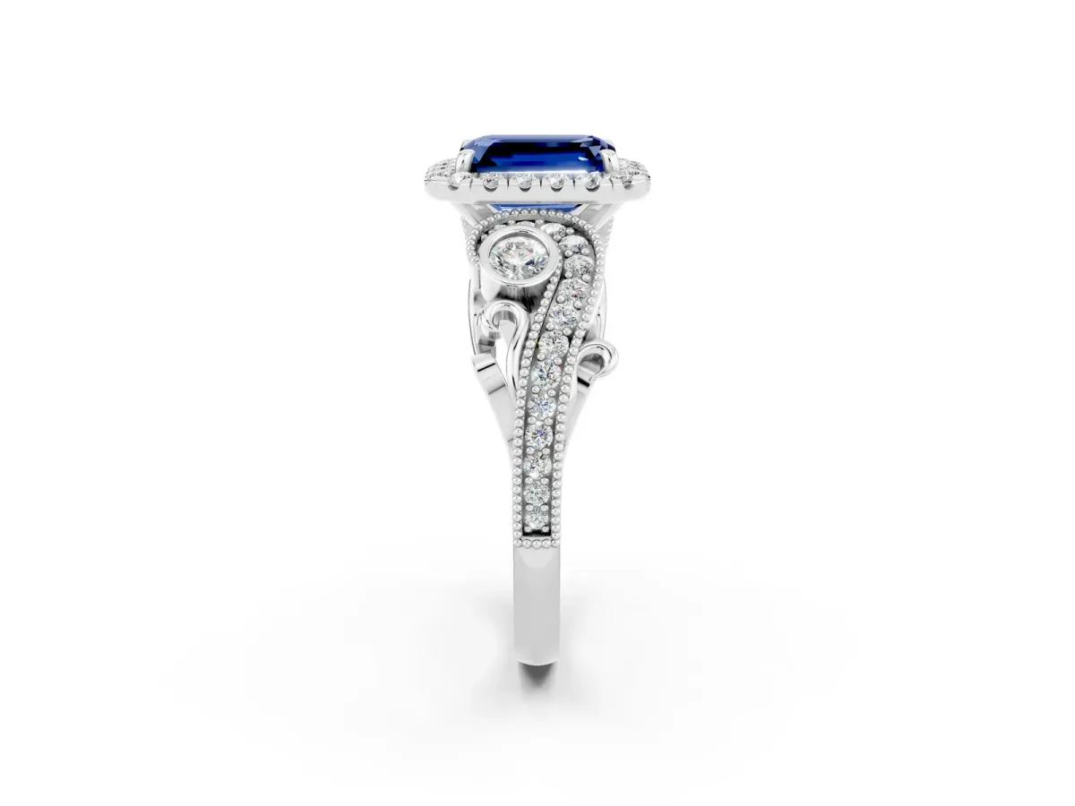 Emerald Cut Blue Sapphire Halo Ring with Milgrain Pavé Band and Four-Prong Setting White gold