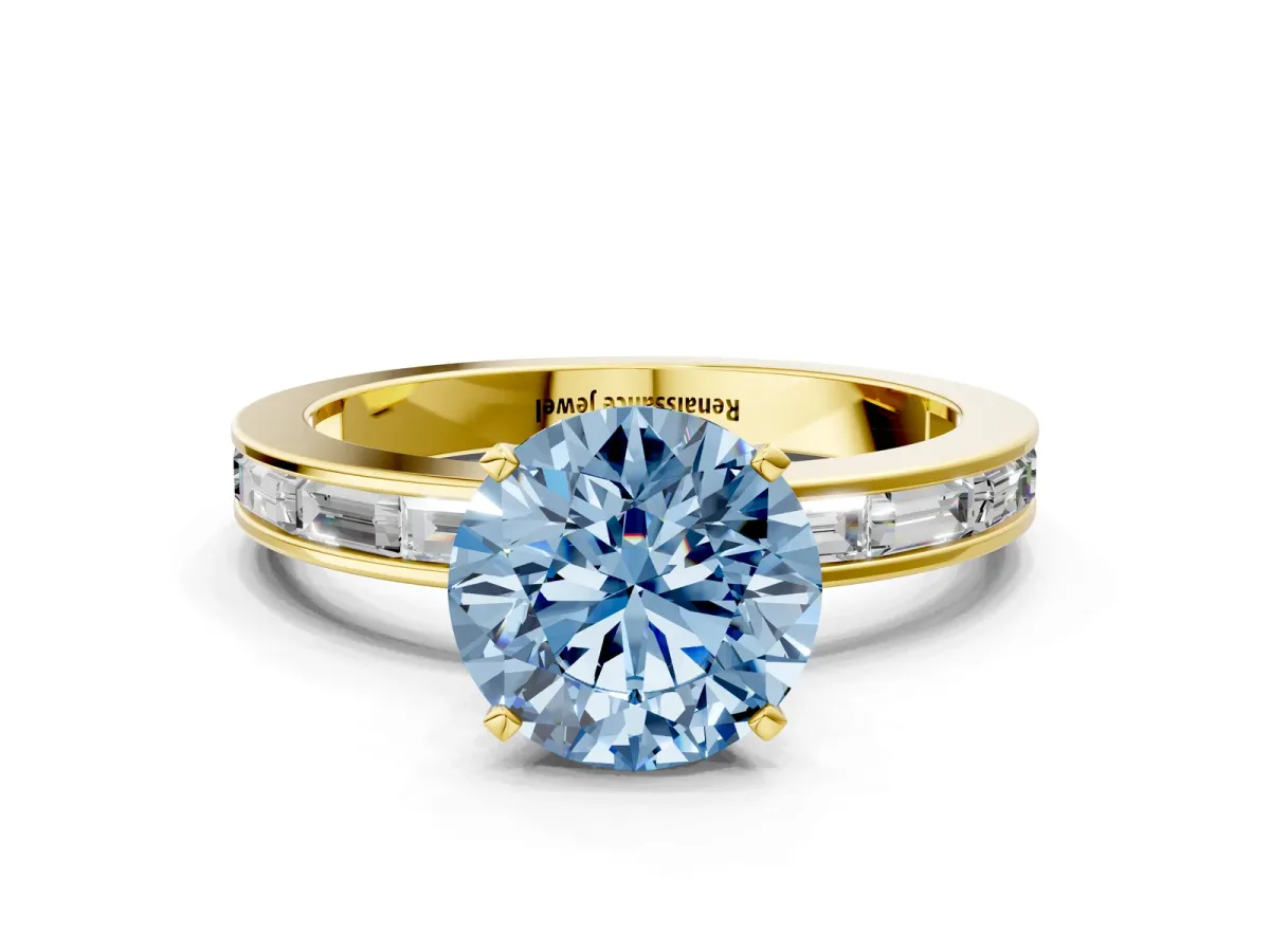 Fancy Blue Round Cut Solitaire Diamond Ring with Channel-Set Baguette Band and Four-Prong Setting Yellow gold