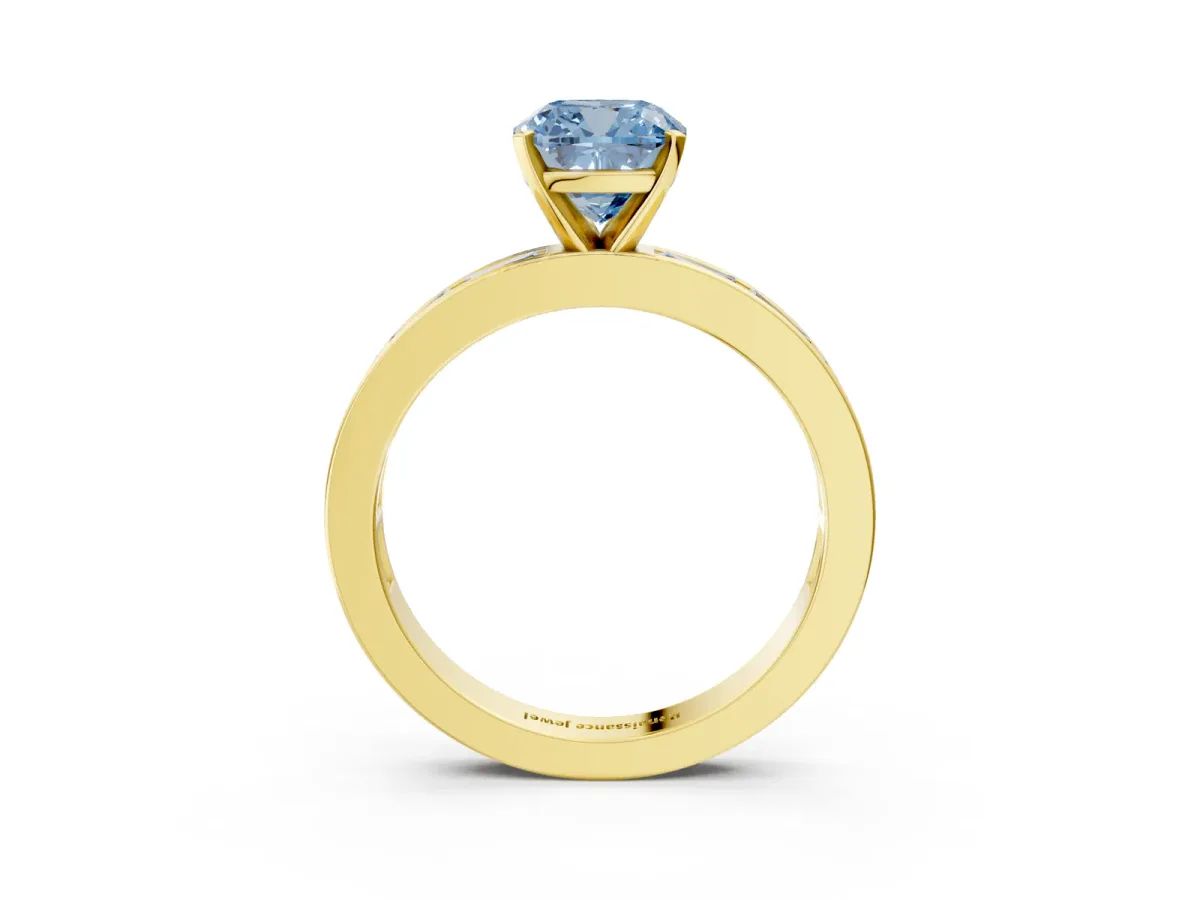 Fancy Blue Cushion Cut Solitaire Diamond Ring with Channel-Set Baguette Band and Four-Prong Setting Yellow gold