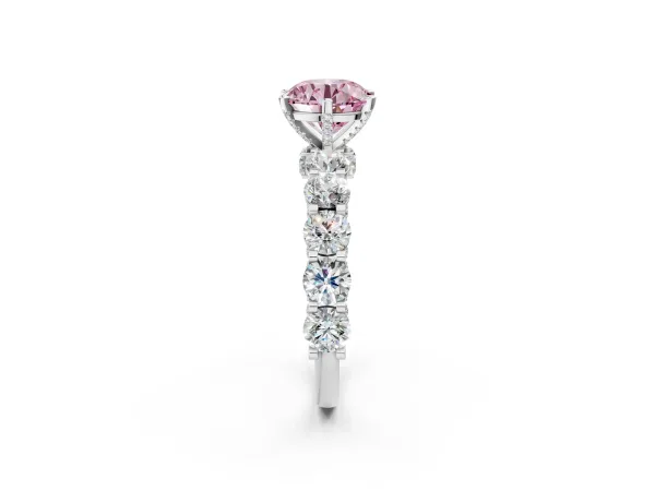 Fancy Pink Round Cut Diamond Side Stone Engagement Ring with Four-Prong Setting Platinum