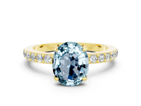 Oval Cut Aquamarine Solitaire Engagement Ring with Pavé Band and Four-Prong Setting Yellow gold