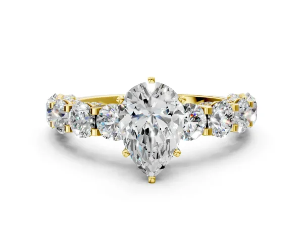 Pear Cut Diamond Side Stone Engagement Ring with Four-Prong Setting Yellow gold