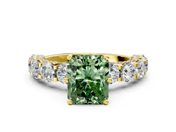 Fancy Green Radiant Cut Diamond Side Stone Engagement Ring with Four-Prong Setting Yellow gold