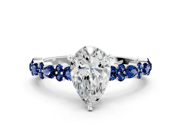Pear Cut Diamond Side Stone Solitaire Ring with Round Blue Sapphire and Four-Prong Setting White gold