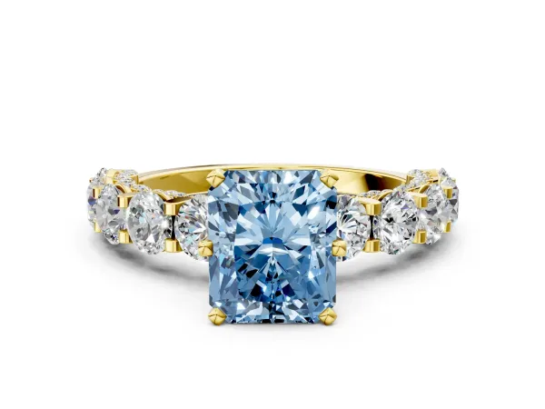 Fancy Blue Radiant Cut Diamond Side Stone Engagement Ring with Four-Prong Setting Yellow gold
