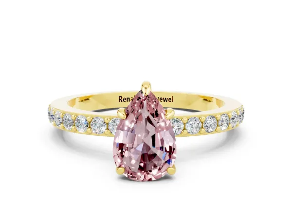 Pear Cut Morganite Solitaire Engagement Ring with Pavé Band and Four-Prong Setting Yellow gold