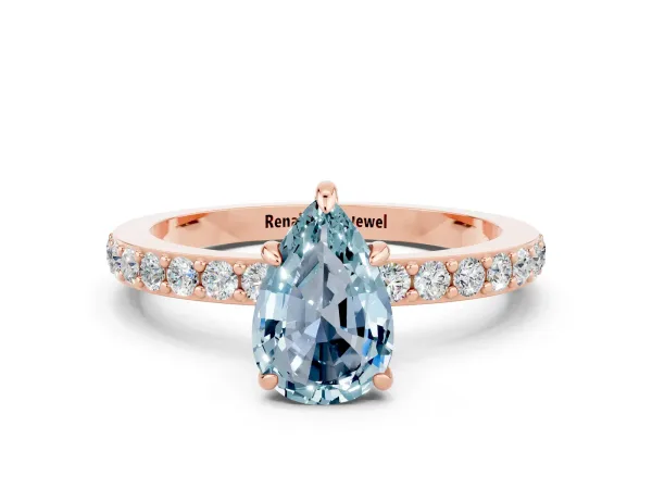 Pear Cut Aquamarine Solitaire Engagement Ring with Pavé Band and Four-Prong Setting Rose gold