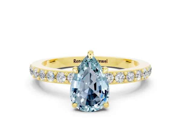Pear Cut Aquamarine Solitaire Engagement Ring with Pavé Band and Four-Prong Setting Yellow gold